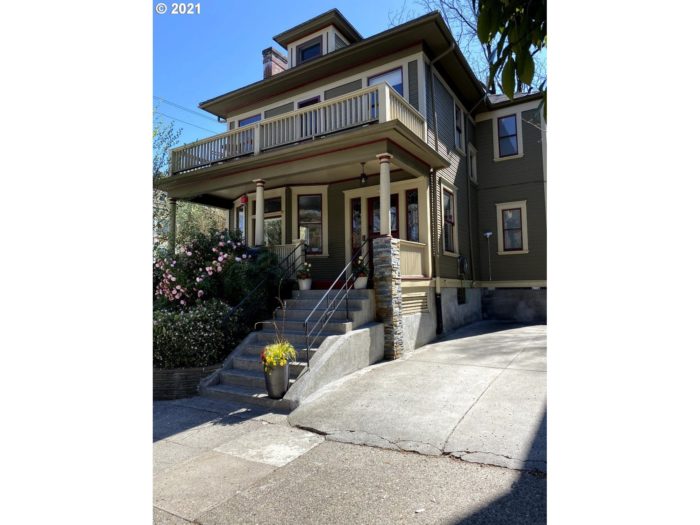 Foursquare home with bay window